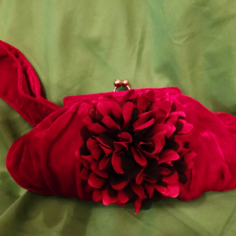 Elegant Red Clutch with Floral Accent